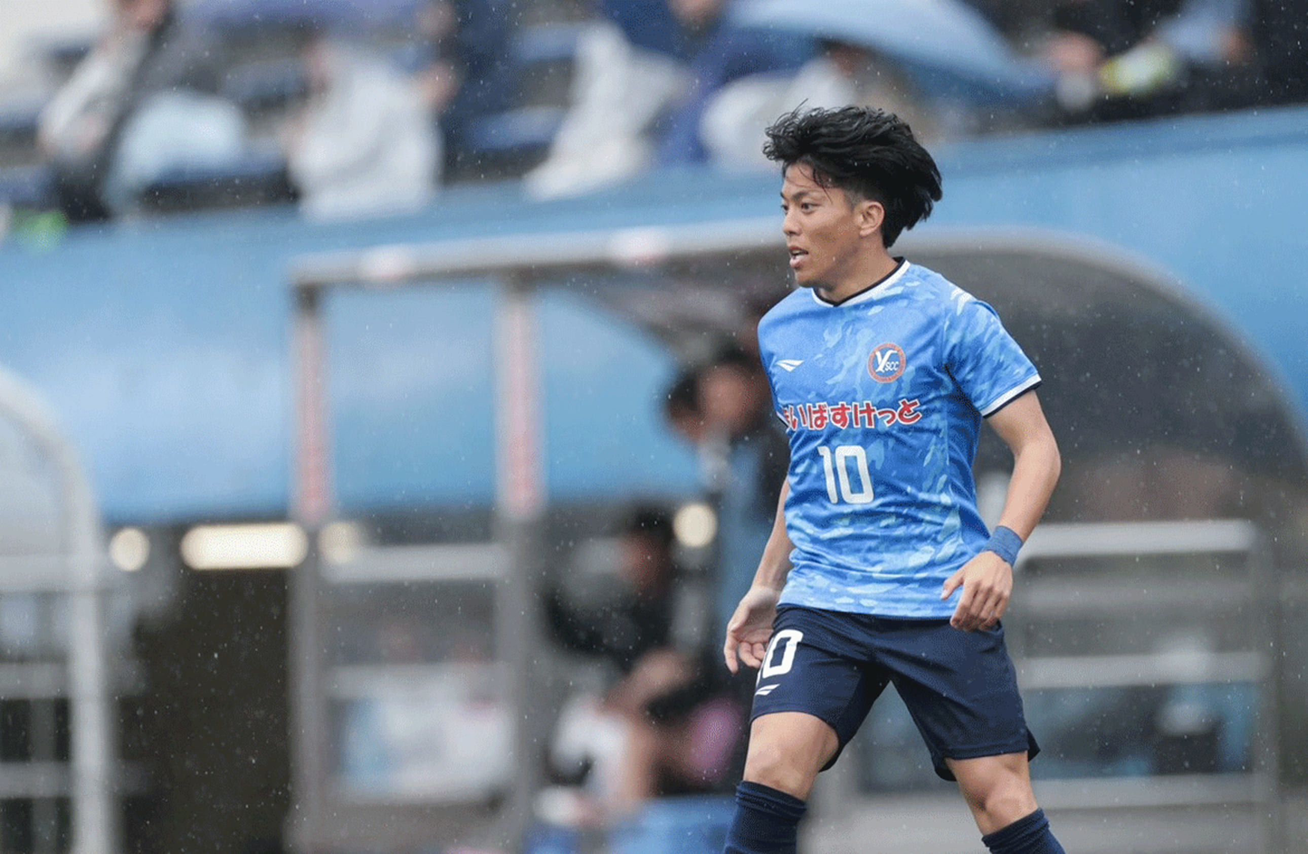 サッカー試合中の選手